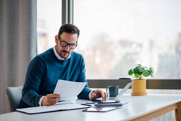 what you need to get pre approved for a mortgage documents and laptop